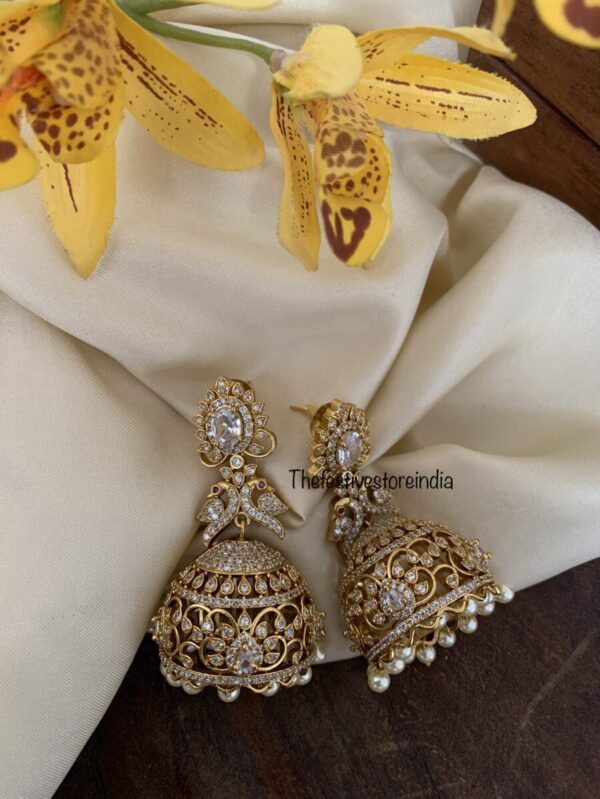AD white jhumkas