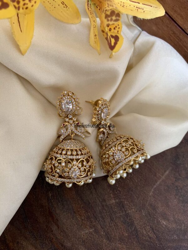 AD white jhumkas