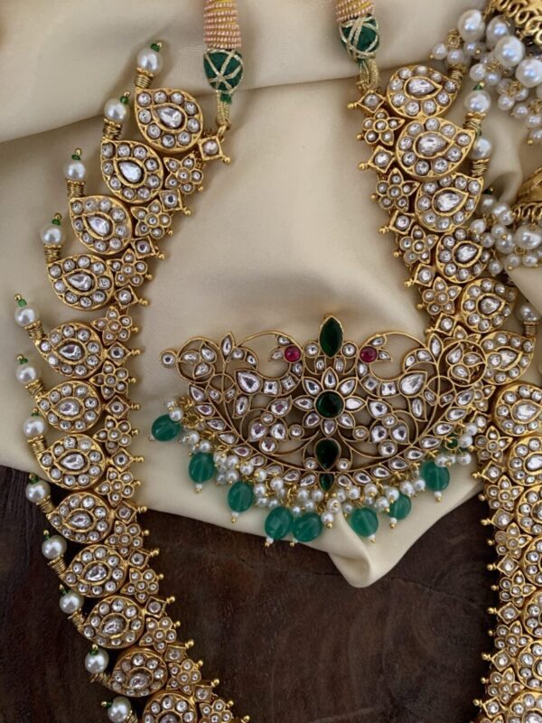 An all white made to order detachable pendant Jadau Mango haara set