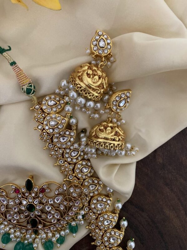 An all white made to order detachable pendant Jadau Mango haara set