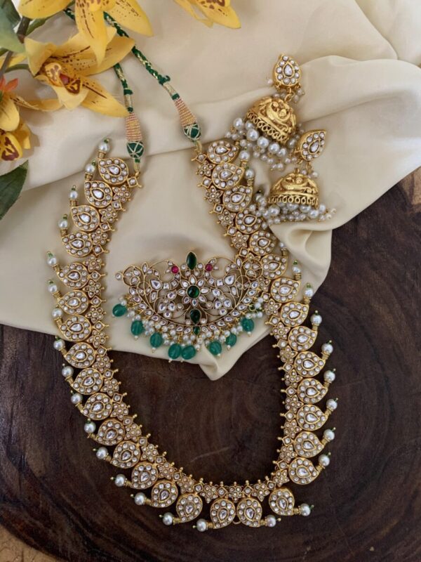 An all white made to order detachable pendant Jadau Mango haara set