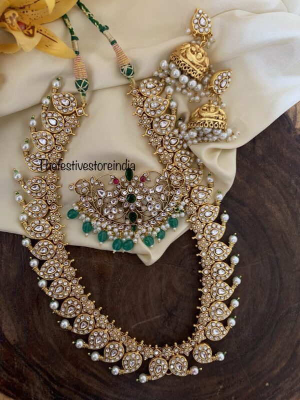 An all white made to order detachable pendant Jadau Mango haara set