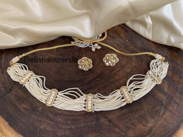 Simplistic yet classy Pachi kundan choker set