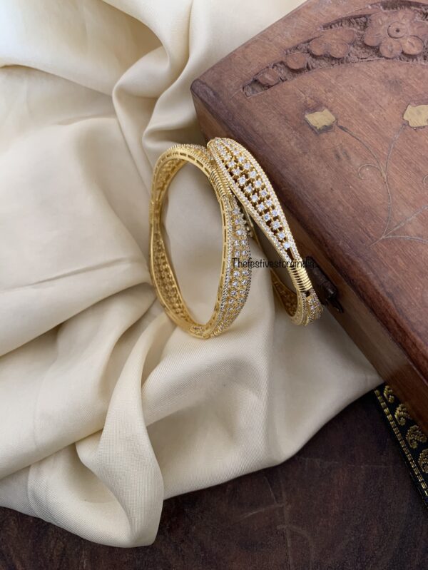 Designer gold polish AD bangles