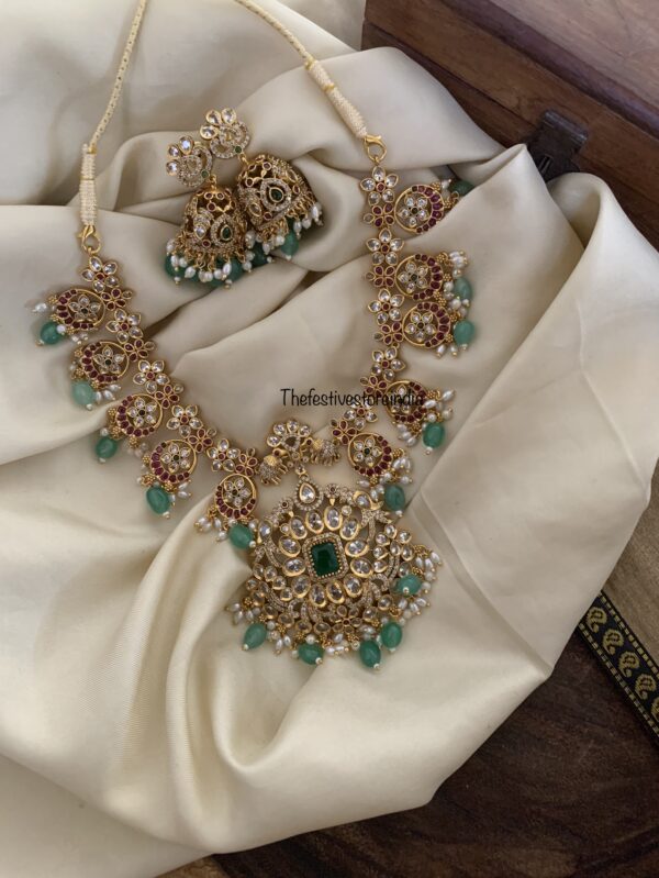 Gold finish bottu beads necklace set