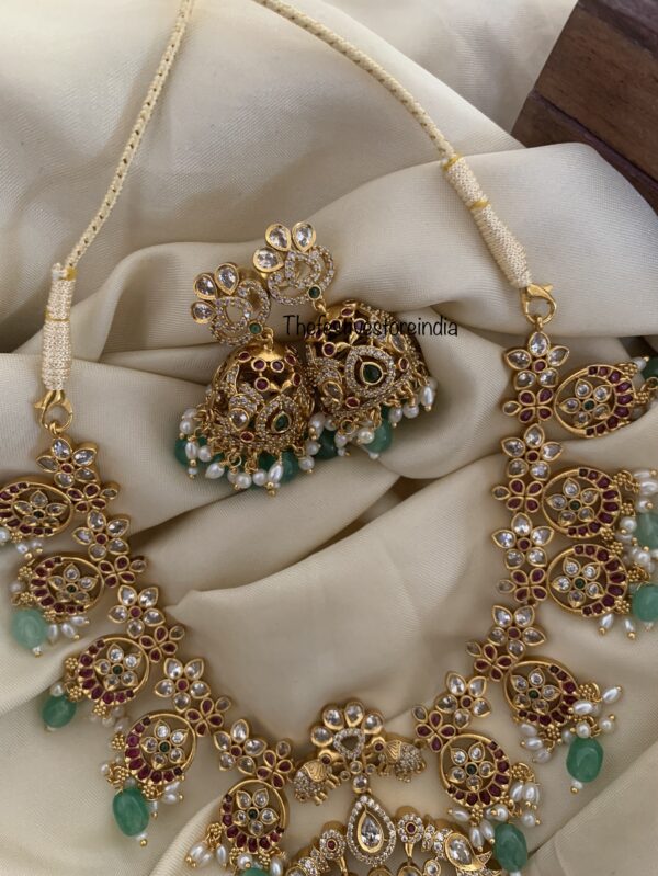 Gold finish bottu beads necklace set