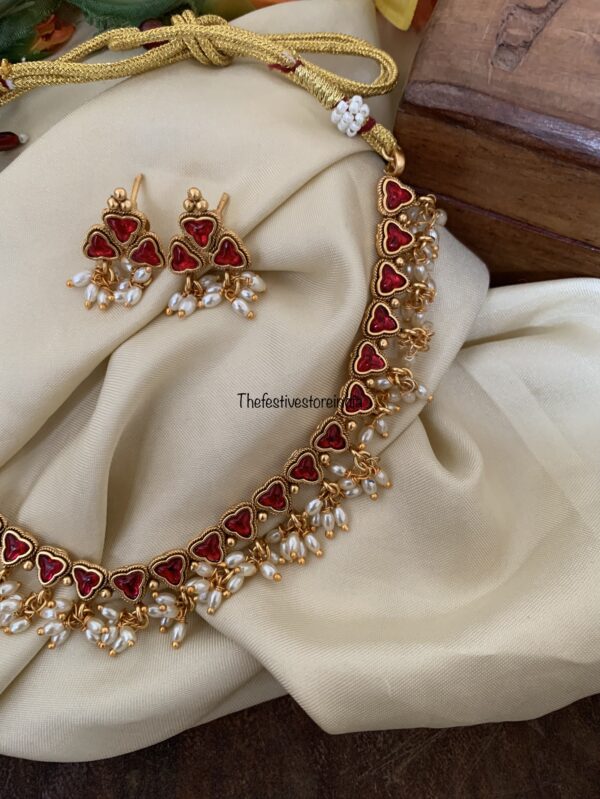 Budgeted red stone rice pearls necklace set