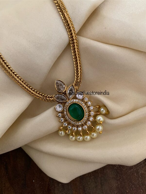 Budgeted AD emerald pendant attigai