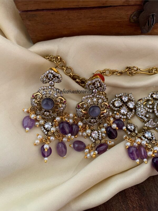 Budgeted Victorian asymmetric purple drops choker set