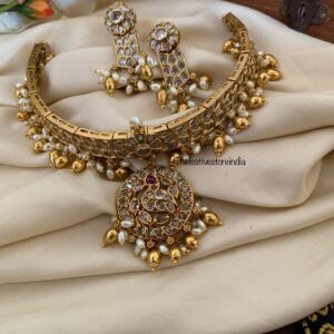 All white attigai style red tikka choker set