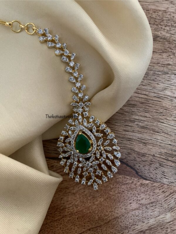 Gold polish diamonds maangtikka - Emerald stone