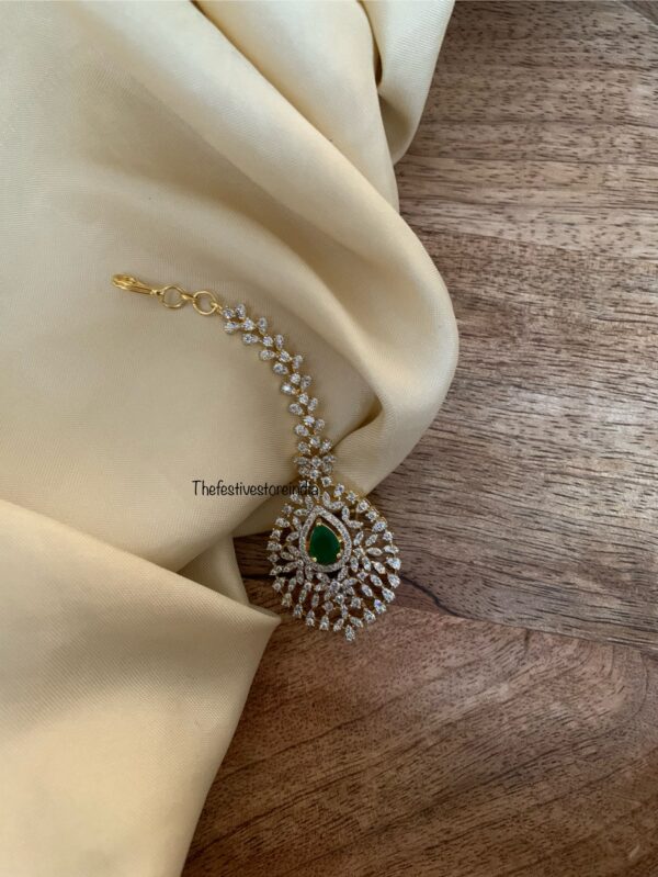 Gold polish diamonds maangtikka - Emerald stone