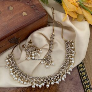 All white Victorian necklace set with maangtikka