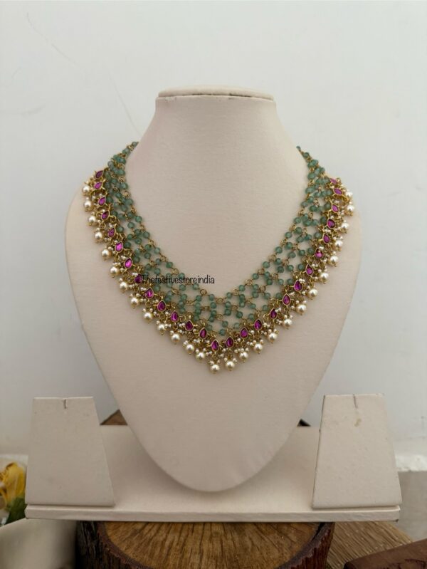 Close knit Jadau green beads with kemp stones & pearls hanging chain | Unique