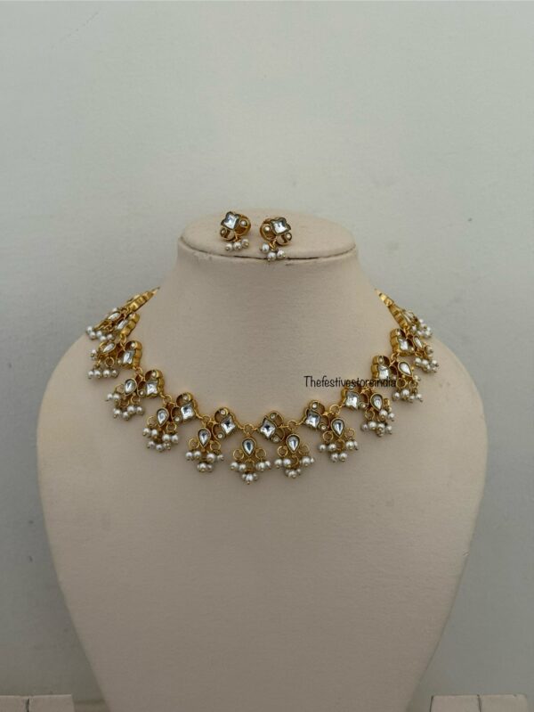 White Jadau kundan carved necklace with screwback earrings  | Unique