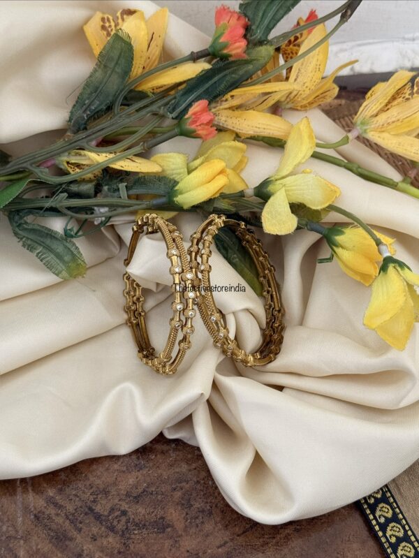 Set of 4 antique polish white stone bangles